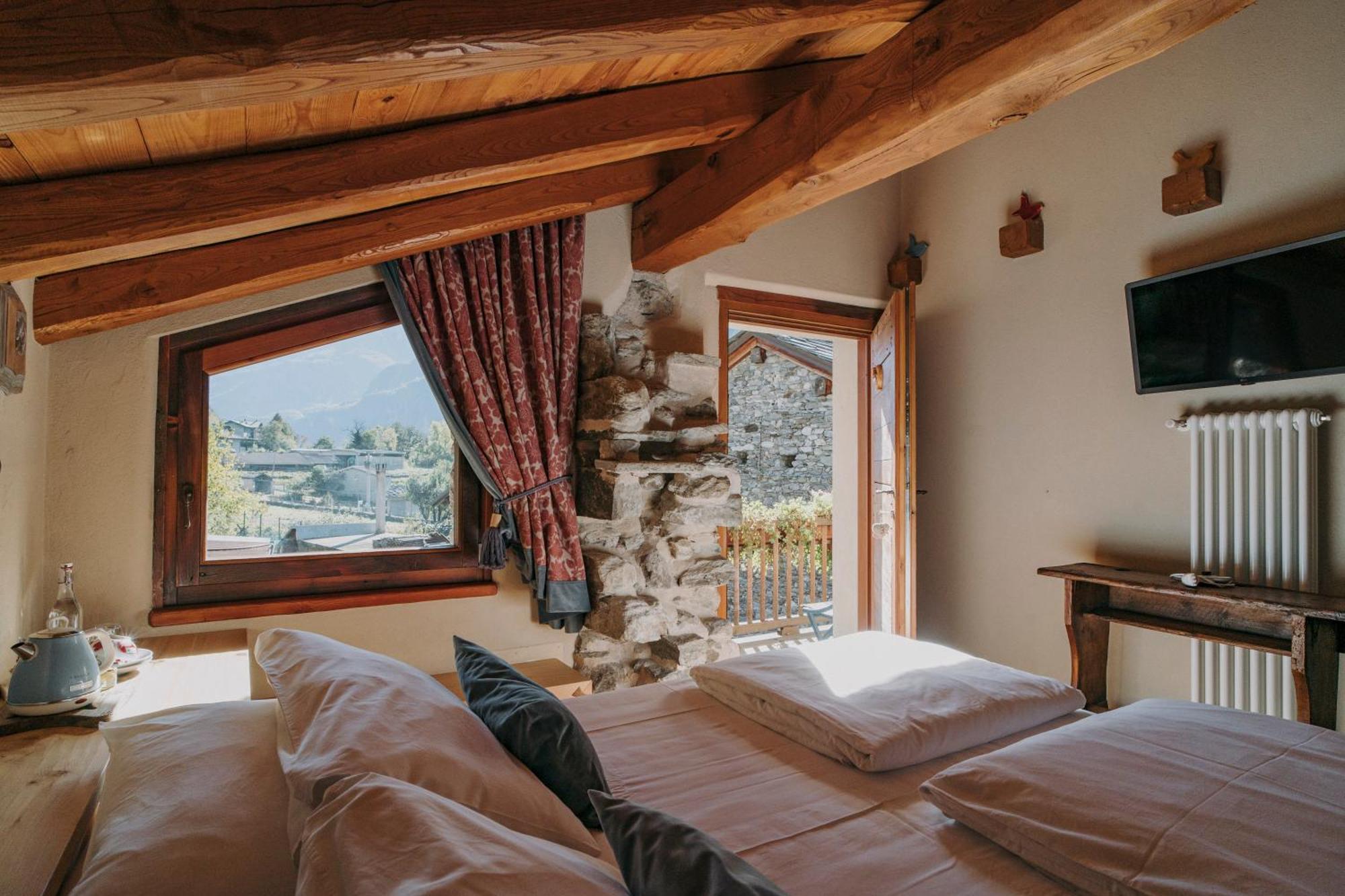 Au Coeur Du Village Chambres D'Hotes & Spa Arnad ภายนอก รูปภาพ
